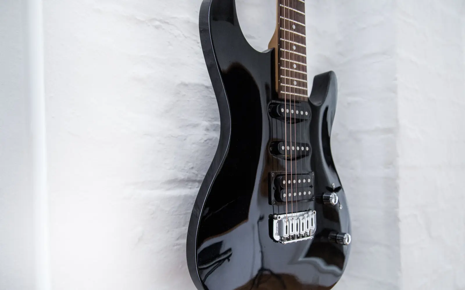 Electric guitar on the wall