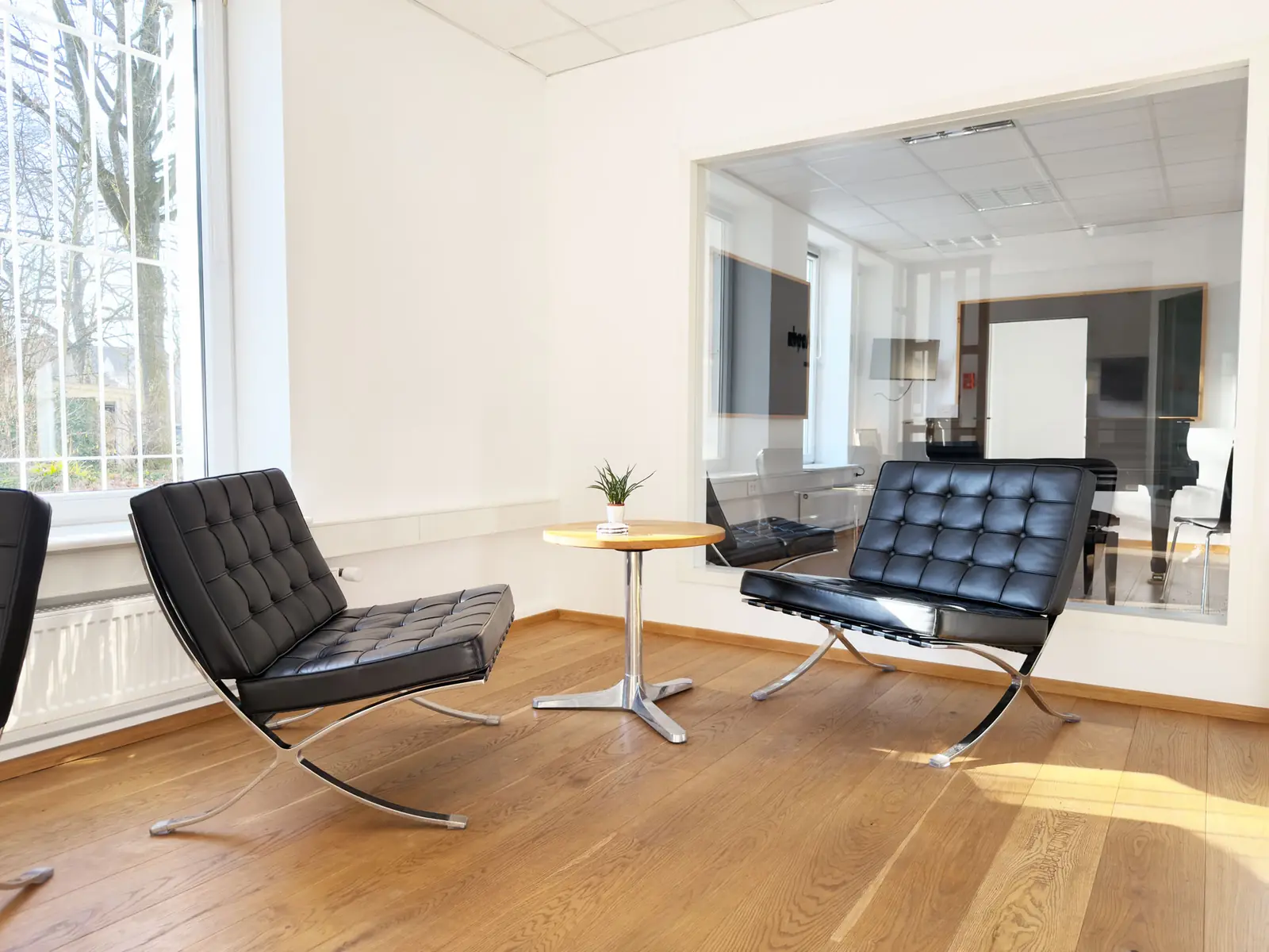Waiting area with armchairs at Music Campus Bielefeld